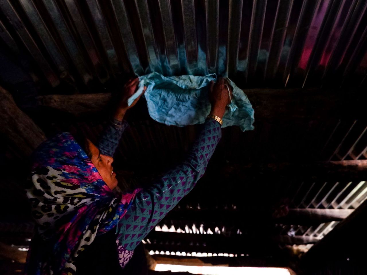 Naseema drying the washed menstrual cloth on her rooftop, away from her husband’s gaze. The tribal women hide their menstruation from male family members including their husbands and do not talk about it openly. Date: 24 April, 2022.